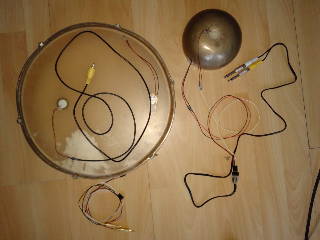 hand drum and tibetan bowl with contact mics